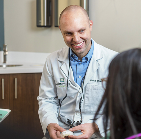 Dentist examining dental patient