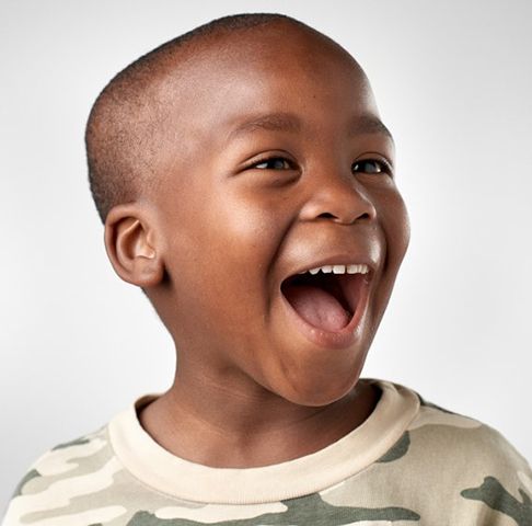 Smiling young boy with a healthy smile with children’s tooth-colored fillings